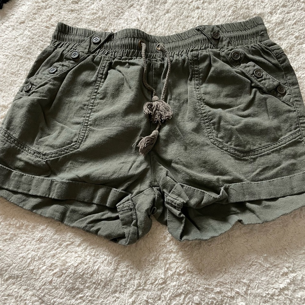 Green army shorts.